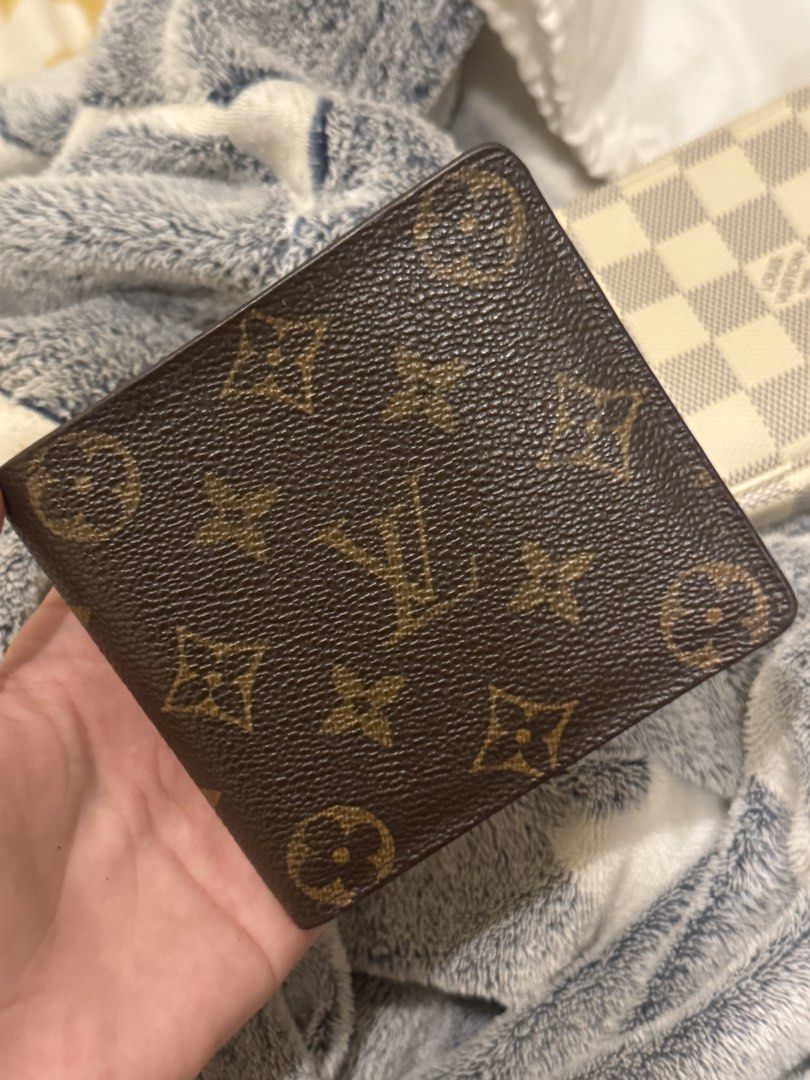 Louis Vuitton Monogram Bifold Wallet (Category: Luxury Bags & Wallets) located in Marikina City. Submitted by mariaxxx.ph (Listing ID 1457373566, Image 2). Description: - Authentic Louis Vuitton bifold wallet - Classic monogram canvas in brown and tan - Interior shows some signs of wear - Plenty of life left, great for everyday use Coded For project as were missing the pocket for the picture slot authentic.