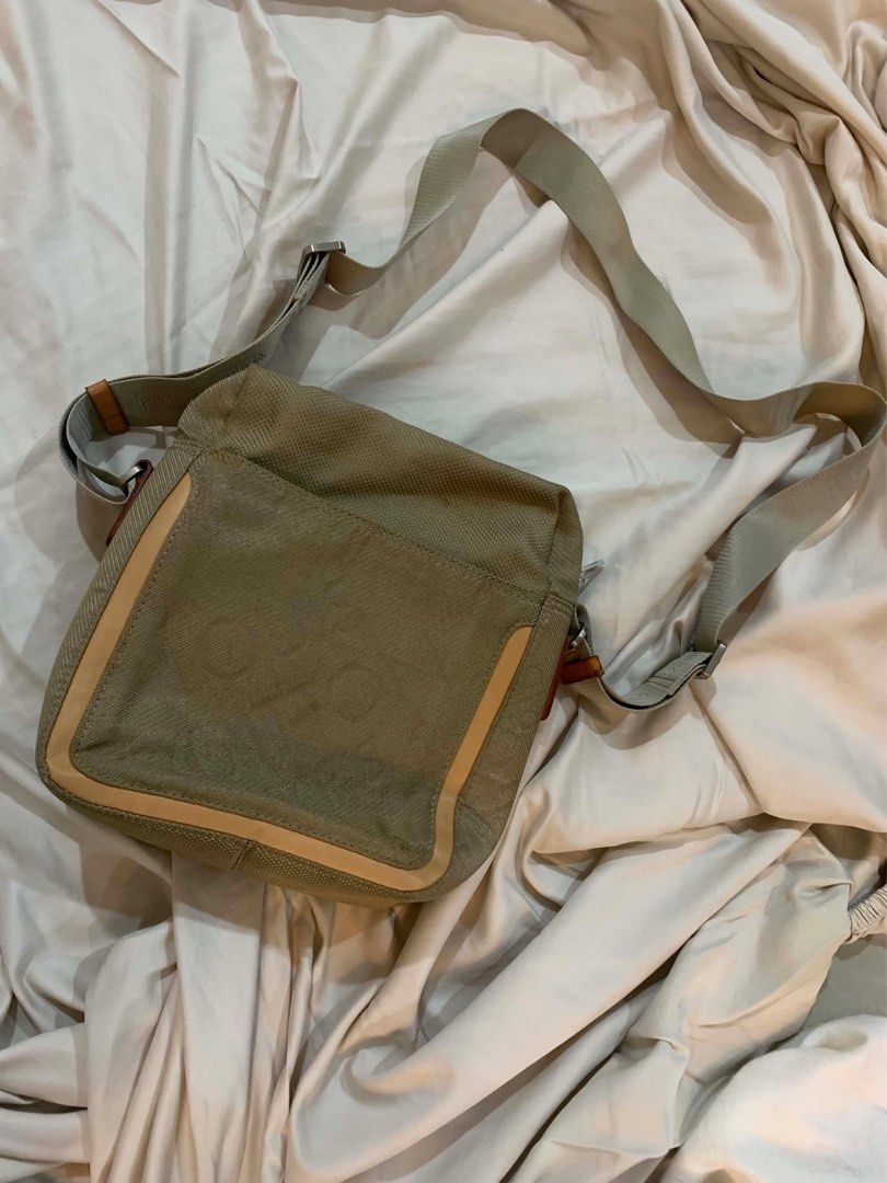 Louis Vuitton Monogram Canvas Crossbody Bag (Category: Luxury Bags & Wallets) located in Quezon City. Submitted by ramonespinas (Listing ID 1457368403, Image 2). Description: - Louis Vuitton crossbody bag - Khaki monogram canvas with tan leather trim - Adjustable strap for comfortable wear - Multiple interior pockets - Minor stains on exterior fabric - Secure zipper closure - Ideal for daily use.