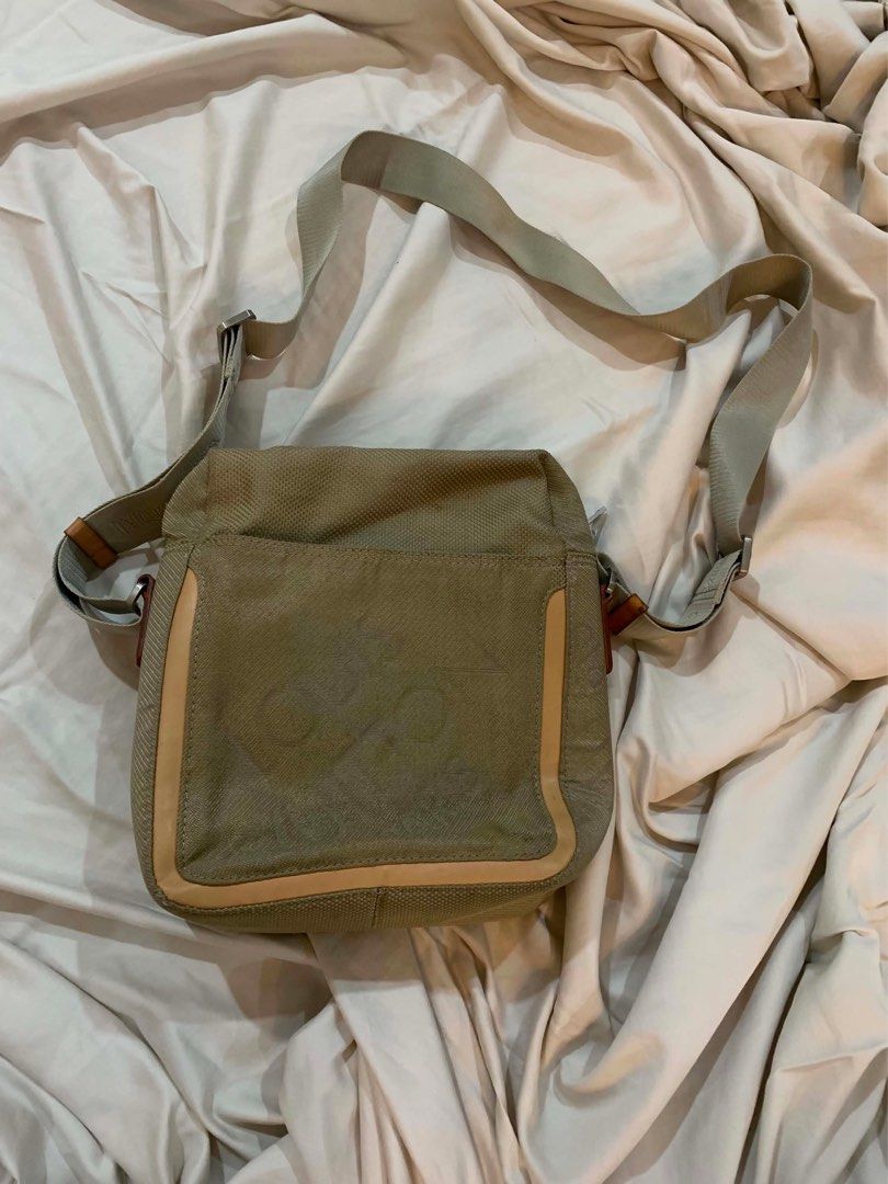 Louis Vuitton Monogram Canvas Crossbody Bag (Category: Luxury Bags & Wallets) located in Quezon City. Submitted by ramonespinas (Listing ID 1457368403, Image 1). Description: - Louis Vuitton crossbody bag - Khaki monogram canvas with tan leather trim - Adjustable strap for comfortable wear - Multiple interior pockets - Minor stains on exterior fabric - Secure zipper closure - Ideal for daily use.