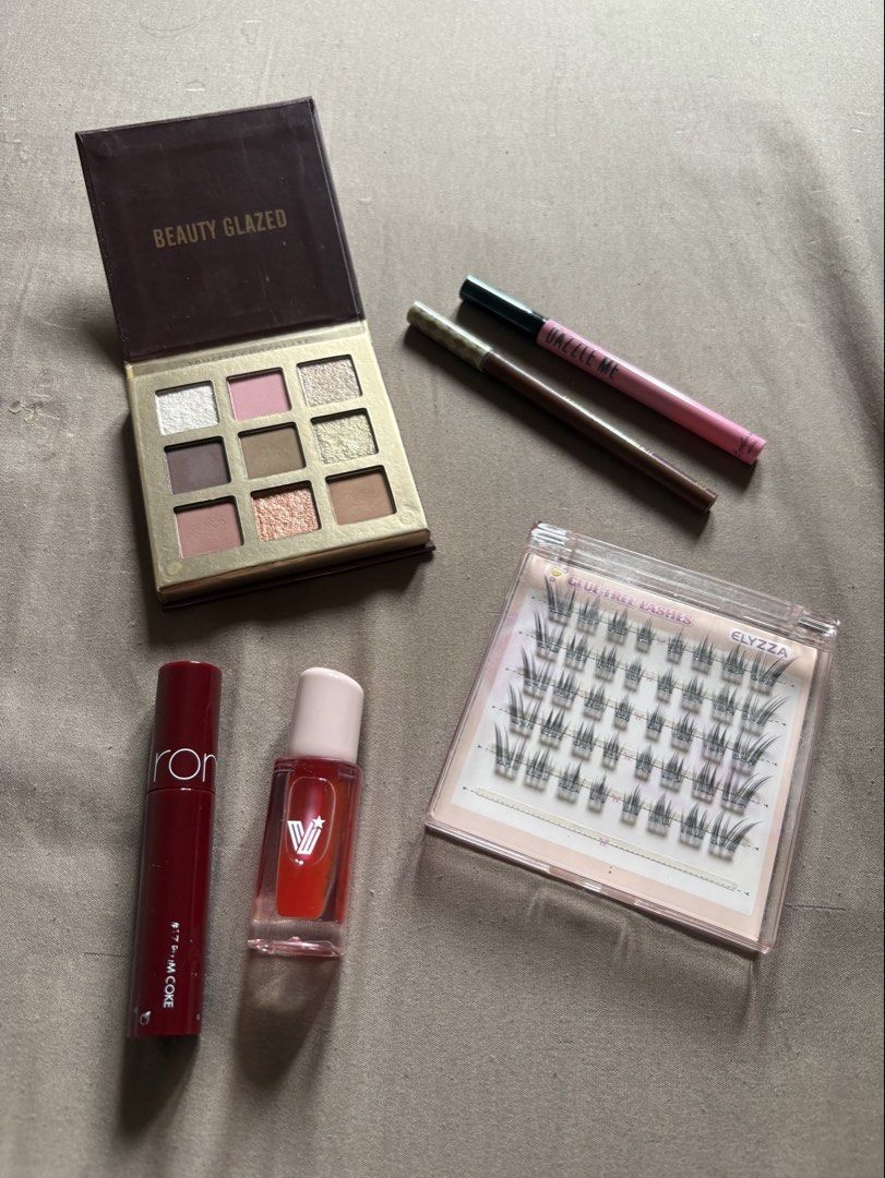 Makeup Bundle (Category: Makeup) located in Marilao. Submitted by lovely.loot (Listing ID 1457359269, Image 1). Description: dazzle me eyeliner biya eyebrow no. 3 beauty glazed eyeshadow palette vice co. lip fresca romand juicy lasting tint in plum coke elyzza cluster lashes.