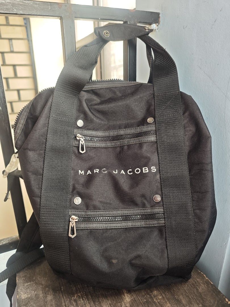 Marc Jacobs Backpack (Category: Backpacks) located in Taguig. Submitted by wear.us.ph (Listing ID 1457398351, Image 2). Description: waterproof layer cracked and ripped..