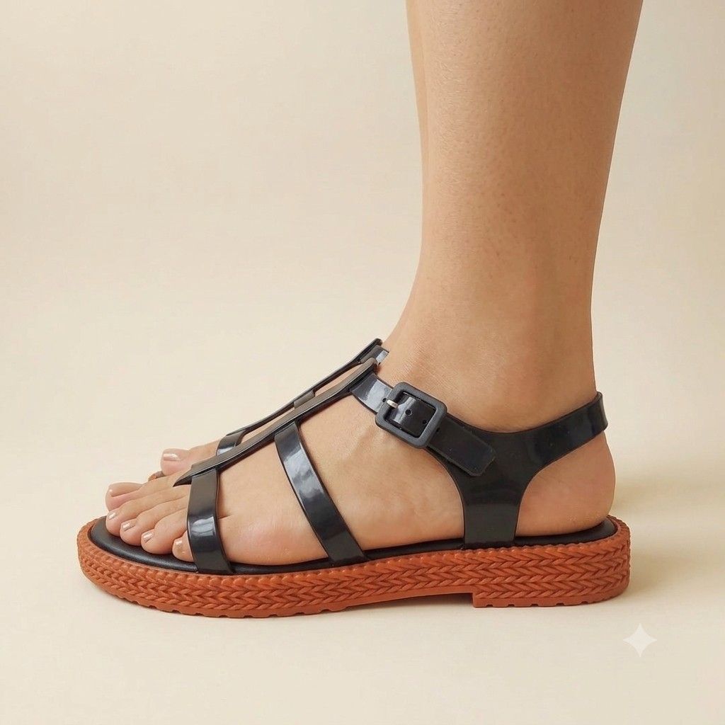 Melissa Black Jelly Gladiator Sandals with Braided Platform (Category: Flats & Sandals) located in Baguio. Submitted by mybirken.stuffph (Listing ID 1457492370, Image 2). Description: - Melissa black jelly gladiator sandals - T-strap design with adjustable buckle - Platform sole with cool braided texture - Reddish-brown sole color - Ideal for casual wear - Made in Brazil.