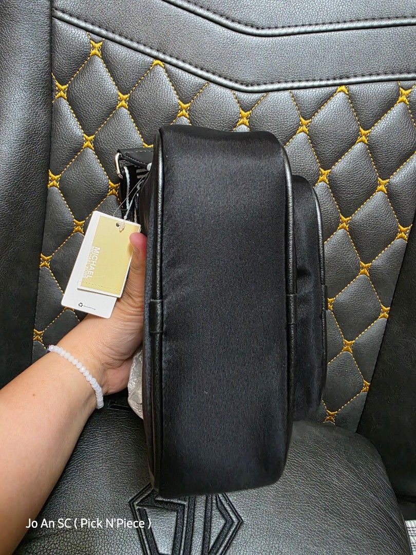 MICHAEL KORS KHAI BLACK XBODY BAG (Category: Cross-body Bags) located in Quezon City. Submitted by joansc (Listing ID 1457500689, Image 3). Description: SOURCED: US 100% ORIGINAL ONLY W/TAG, POLYPLASTIC, CARE CARD.