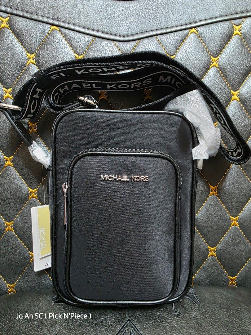 MICHAEL KORS KHAI BLACK XBODY BAG (Category: Cross-body Bags) located in Quezon City. Submitted by joansc (Listing ID 1457500689, Image 1). Description: SOURCED: US 100% ORIGINAL ONLY W/TAG, POLYPLASTIC, CARE CARD.