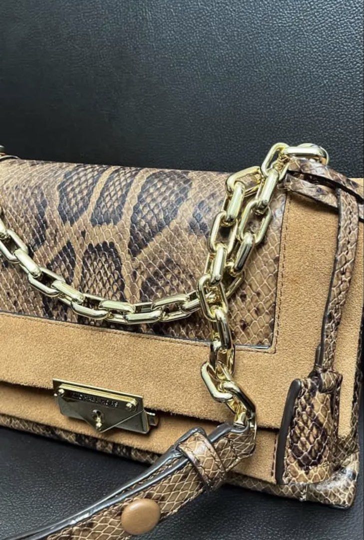 Michael Kors Medium Cece in Snake Print (Category: Luxury Bags & Wallets) located in Manila. Submitted by declutterqueen25 (Listing ID 1457458289, Image 3). Description: Authentic/Original Used only twice Complete with dust bag and care card Rfs: need funds for home improvement damage from the habagat last week.