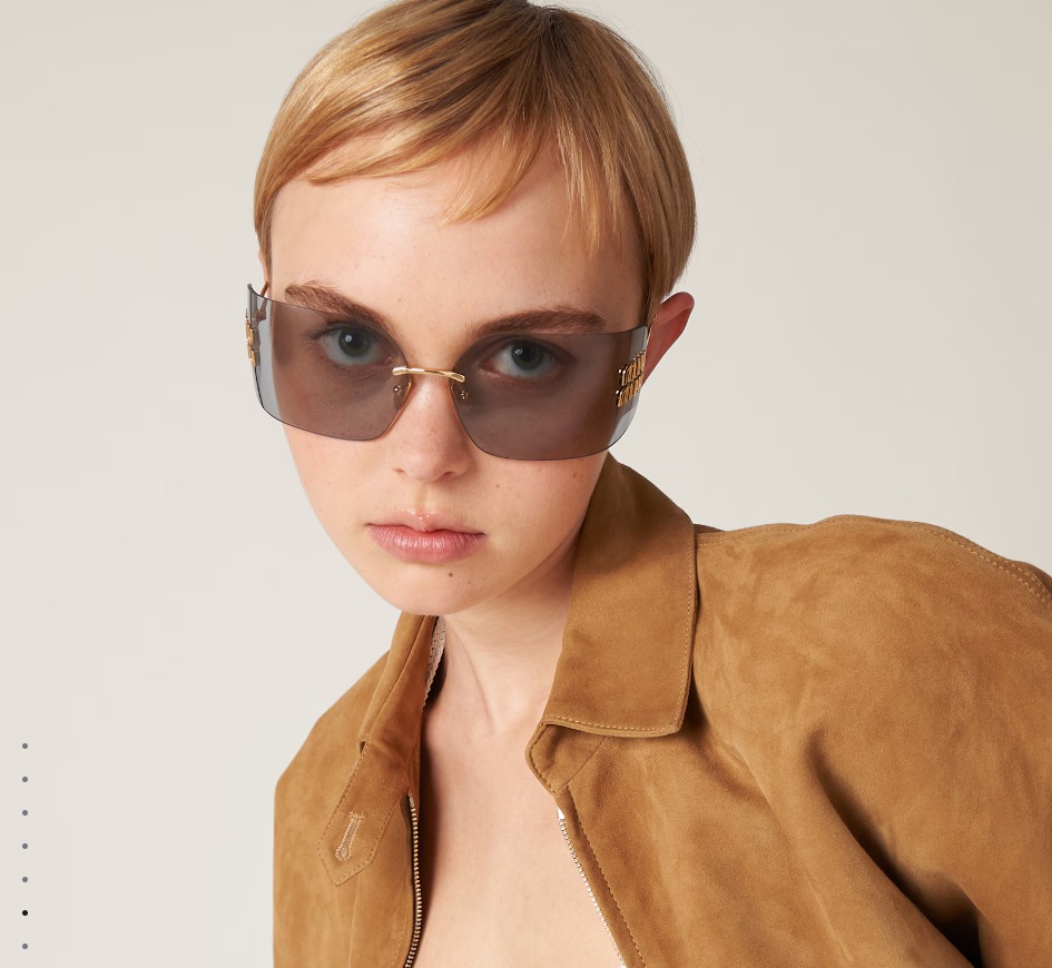 MIU MIU Aube sunglasses (Category: Sunglasses & Eyewear) located in Bacoor. Submitted by fafofa (Listing ID 1457498833, Image 1). Description: MIU MIU Aube sunglasses Metal sunglasses with a sophisticated, contemporary design. The ultra-light rimless style is characterized by the curved lenses embellished with the imposing vertical Miu Miu logo. Product code: SMU54Y_E5AK_FE30B_C_080 Metal frame front in Gold Frame not compatible with graduated le