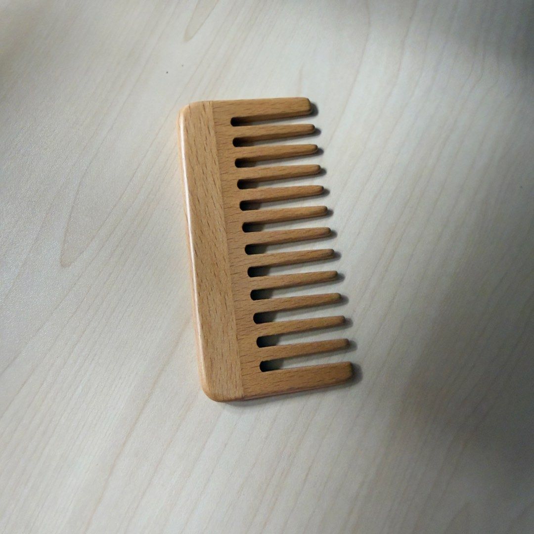 MUJI Beech Wood Hair Comb (Category: Hair) located in Las Pinas. Submitted by saebisells (Listing ID 1457477786, Image 3). Description: ↠ Brand: MUJI ↠ Material: Natural beech wood ↠ Approx. 10.7 cm long ↠ Wide, rounded teeth designed to glide gently through the hair ↠ Compact and lightweight; easy to carry in a pouch or travel bag ↠ Comes with original MUJI box ↠ Lightly used / tried only; please clean before personal use ↠ Selling because I pre