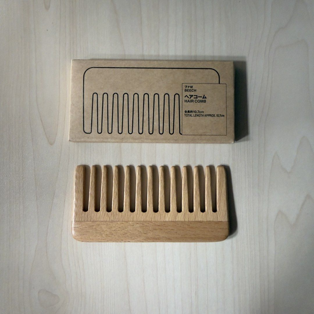 MUJI Beech Wood Hair Comb (Category: Hair) located in Las Pinas. Submitted by saebisells (Listing ID 1457477786, Image 1). Description: ↠ Brand: MUJI ↠ Material: Natural beech wood ↠ Approx. 10.7 cm long ↠ Wide, rounded teeth designed to glide gently through the hair ↠ Compact and lightweight; easy to carry in a pouch or travel bag ↠ Comes with original MUJI box ↠ Lightly used / tried only; please clean before personal use ↠ Selling because I pre