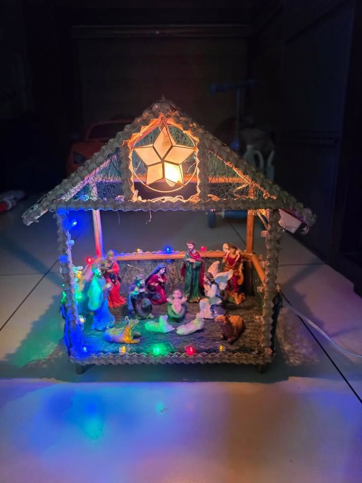 Nativity Scene with Stable and Figures (Category: Other Home Decor) located in Manila. Submitted by gencomanila (Listing ID 1457422499, Image 1). Description: - Complete Nativity Set with Stable - Includes Mary, Joseph, baby Jesus, shepherds, angels, and animals - Stable features a star lantern - Colorful LED lights included - Ideal for Christmas decoration - Ready for immediate display.