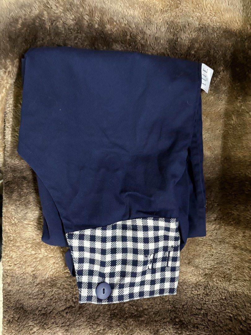 Navy Blue Pinafore Apron with Gingham Pockets (Category: Dresses) located in Makati City. Submitted by neelojosue75925 (Listing ID 1457454190, Image 3). Description: - Cute navy blue pinafore apron - Gingham trim on chest and side pockets - Adjustable straps - Tie at the back - Ideal for cooking, crafting, or gardening - Easy to wear and wash - Perfect for everyday use.