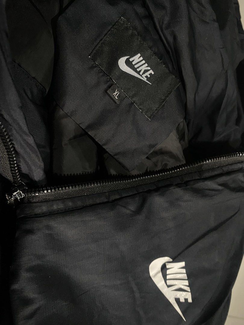 Nike Black Hooded Jacket XL (Category: Coats, Jackets and Outerwear) located in Mabalacat. Submitted by bargzleisurewear (Listing ID 1457502746, Image 2). Description: - Black Nike jacket with hood - Full zip closure - Two side pockets - Nike logo on chest and back - Size XL - Ideal for everyday wear.