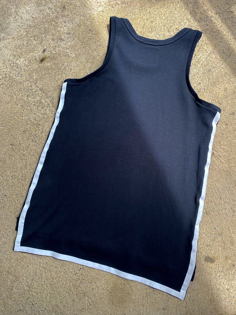 Nike Tech Fleece (Category: Tshirts & Polo Shirts ) located in Bayombong. Submitted by fliptique (Listing ID 1457478351, Image 3). Description: Nike Tank Top Tech Fleece Excellent Condition Size : Medium Dimes : 20”x29”31.3” Shoulder To Shoulder : 12.3” Hem : 21” Color Rate : 9 Issue : ❌❌❌ 550 + sf Nueva Vizcaya Loc Hit a message if interested .