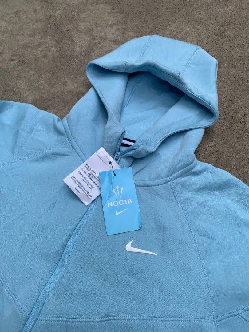 Nike x nocta (Category: Activewear) located in Bula. Submitted by justinejar75338 (Listing ID 1457362838, Image 3). Description: NIKE X NOCTA TECH FLEECE FULL ZIP Size 2xl on tag Xl fitting width 22 to 23 length 28 to 29 brand new condition color rate 9.5 to 10 issue see Last pic pm for more info hearing offer 📩📩📩.
