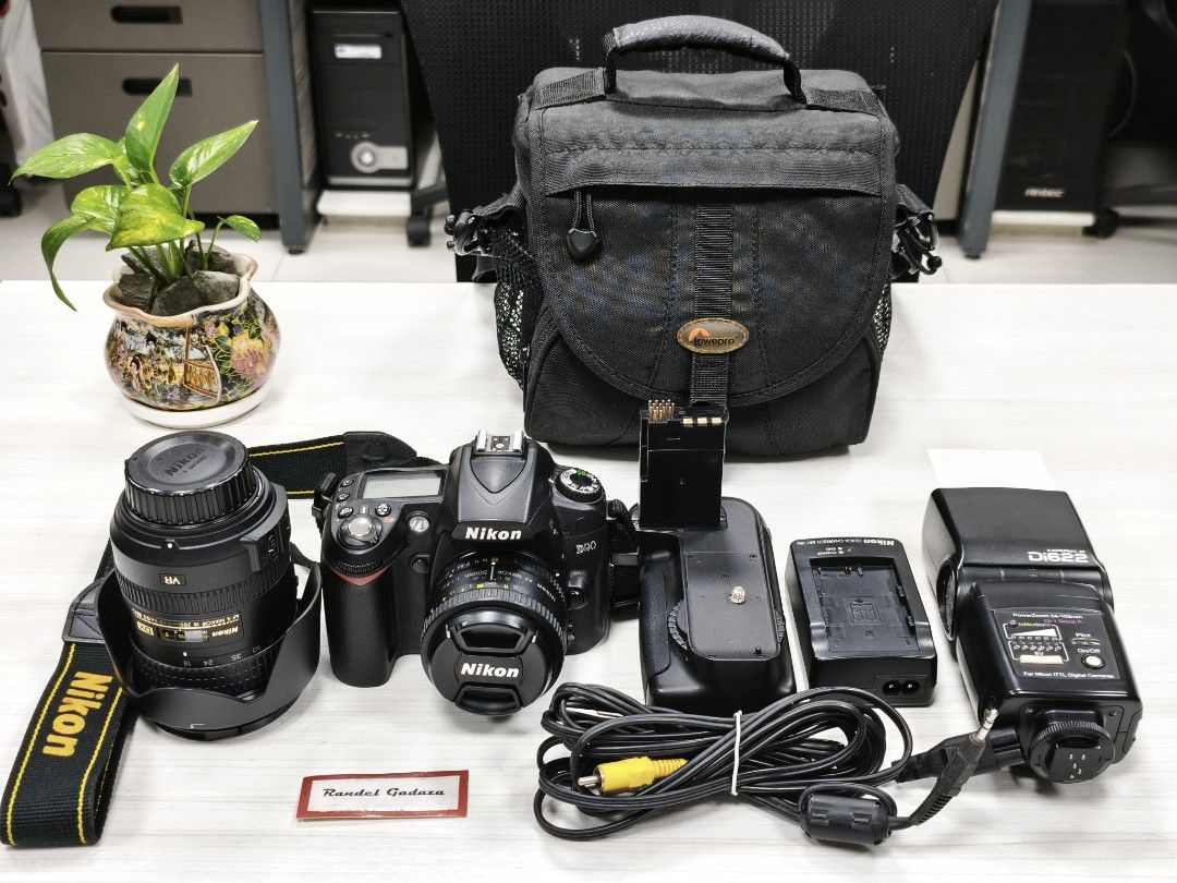 Nikon d90 Bundle (Category: Cameras) located in Muntinlupa City. Submitted by rangadz (Listing ID 1457458714, Image 1). Description: nasaan na kaya yung naghahanap nito? Bundle sale‼️ Nikon D90 hindi masyado nagamit 10,344 shutter count only - nikon 50mm 1.8d (excellent pa) superb IQ - nikon 18-200mm VR II (walk-around lens) halos bago parin -intact markings - nissin Di622 mark II speedlight - Generic Battery grip - lowepro camera Bag - 8g SD car