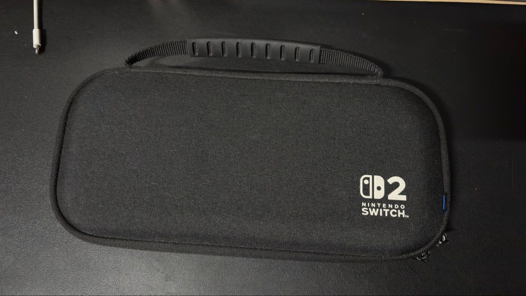 Nintendo Switch 2 Hardshell Case (Category: Cases & Sleeves) located in Manila. Submitted by decluttersgaloreph (Listing ID 1457514311, Image 1). Description: Original Nintendo Switch 2 Hardshell Case (Hori) ₱500 (slightly negotiable) 10 card slots No stitch issue RFS: Bought a new one :).