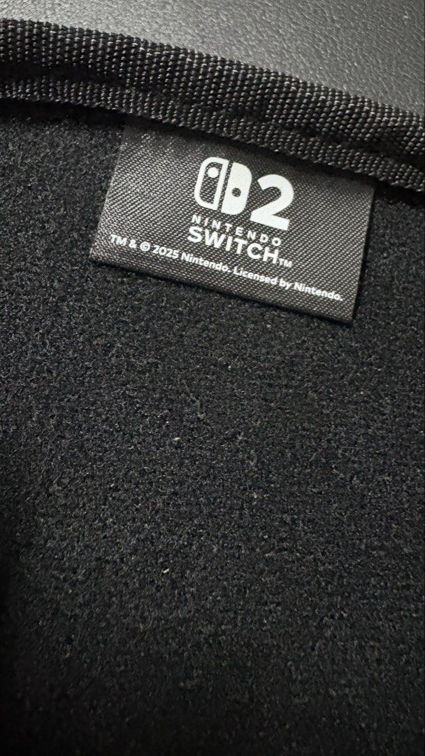 Nintendo Switch 2 Hardshell Case (Category: Cases & Sleeves) located in Manila. Submitted by decluttersgaloreph (Listing ID 1457514311, Image 3). Description: Original Nintendo Switch 2 Hardshell Case (Hori) ₱500 (slightly negotiable) 10 card slots No stitch issue RFS: Bought a new one :).