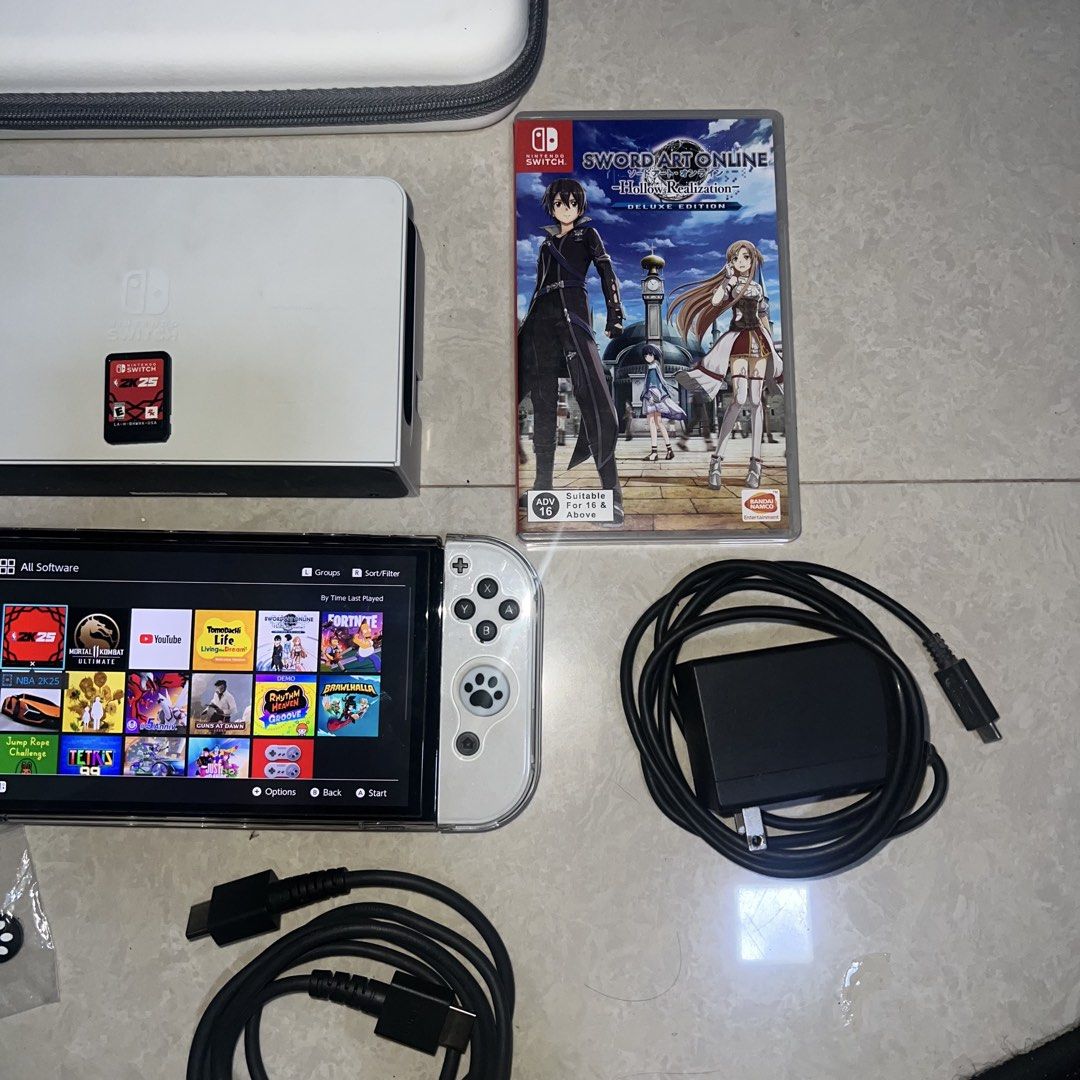 Nintendo Switch OLED White Console with Games & Accessories (Category: Nintendo) located in Caloocan City. Submitted by vanirrafinds (Listing ID 1457489223, Image 3). Description: As is. Pass sa reseller na barat. No issue. Nandiyan na lahat sa pic. Matagal ma lowbat. Unli check sa meet up. Meet up SMFAIRVIEW.