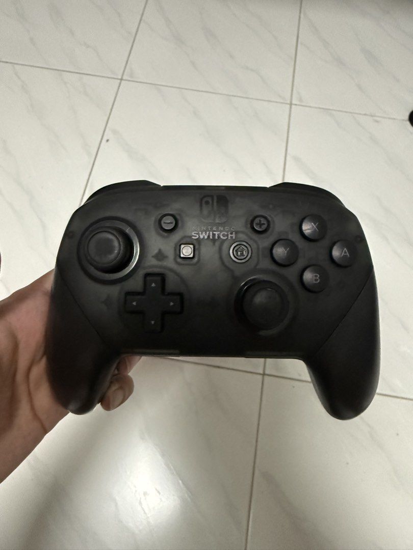 Nintendo switch pro controller (Category: Controllers) located in Singapore. Submitted by forever133 (Listing ID 1457422965, Image 2). Description: .