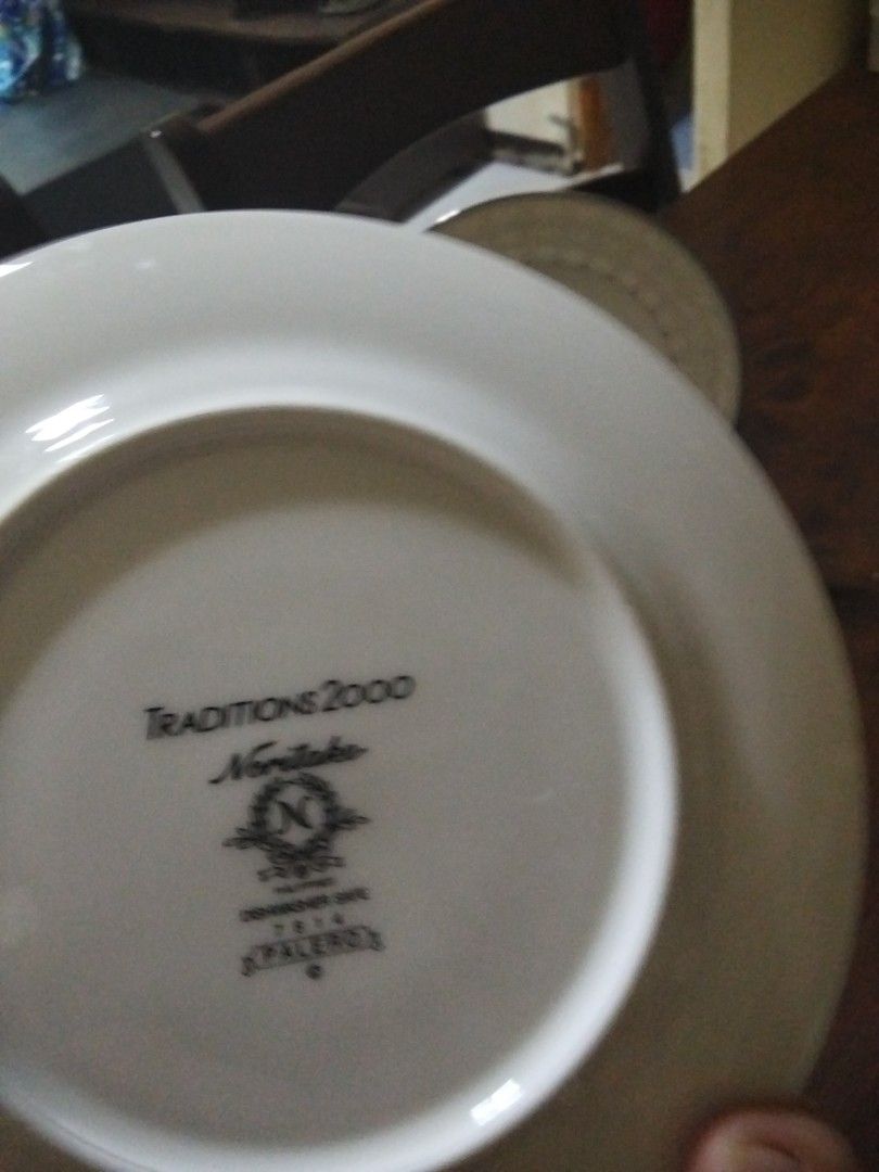 Noritake Traditions 2000 Dinner Plates Set (Category: Dinnerware & Cutlery) located in Antipolo. Submitted by olayerm1213 (Listing ID 1457402948, Image 3). Description: - Set of Noritake Traditions 2000 dinner plates - Classic white with decorative geometric rim and silver accents - Dishwasher safe for easy cleaning - Ideal for both everyday dining and special occasions - Sold as a complete set.
