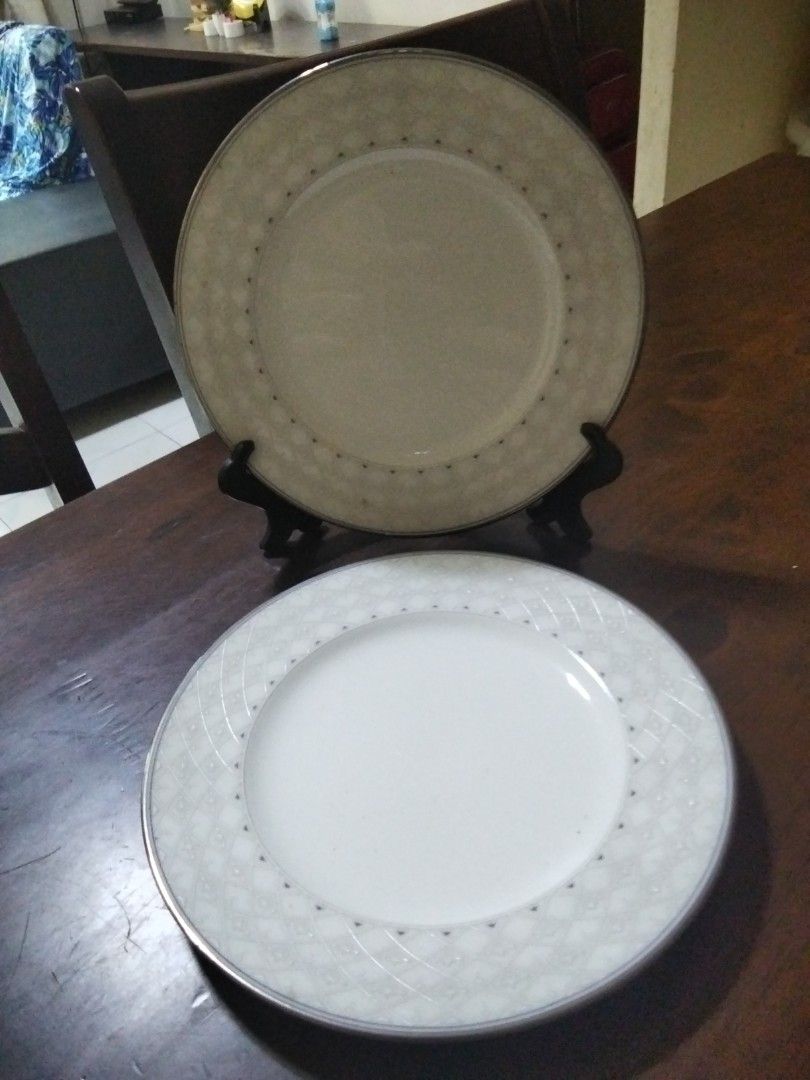 Noritake Traditions 2000 Dinner Plates Set (Category: Dinnerware & Cutlery) located in Antipolo. Submitted by olayerm1213 (Listing ID 1457402948, Image 1). Description: - Set of Noritake Traditions 2000 dinner plates - Classic white with decorative geometric rim and silver accents - Dishwasher safe for easy cleaning - Ideal for both everyday dining and special occasions - Sold as a complete set.