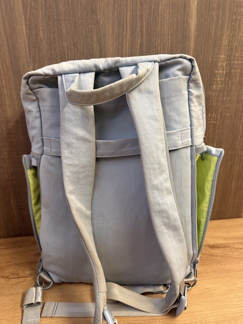 Offtoco backpack (Category: Backpacks) located in Singapore. Submitted by jellyfish1008 (Listing ID 1457459113, Image 2). Description: - Colour: Light blue - Interior Colour: Bright Lime Green - Features: Multiple internal pockets, zipped compartment, durable material - Style: Practical and stylish backpack.