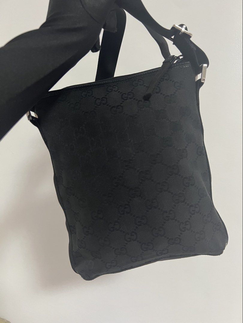 Original Gucci Black Canvas Sling Bag (Category: Luxury Bags & Wallets) located in Cavite. Submitted by authenticbagshavenbyvalg (Listing ID 1378162687, Image 2). Description: 💯Guaranteed Original very good condition no issue Authentic Bags Haven No return No Exchange Money back guarantee unless proven fake No low ballers No Swap No Joy Reservers PLEASE MANAGE YOUR EXPECTATIONS, youre buying a preloved item. Accepts layaway on certain items 30% 