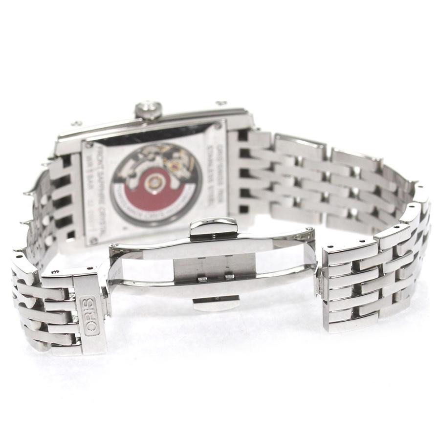 Oris 7656 Rectangular date Automatic White Dial (Category: Watches) located in Singapore. Submitted by themacvision (Listing ID 1457405579, Image 2). Description: Near mint condition Oris Rectangular Date, reference 7656. * Automatic mechanical movement * White dial with Arabic numerals * Date display * Original stainless steel bracelet * Fits wrist up to approximately 17.5cm * 25 jewels * Classic rectangular design * Watch only * No papers or se