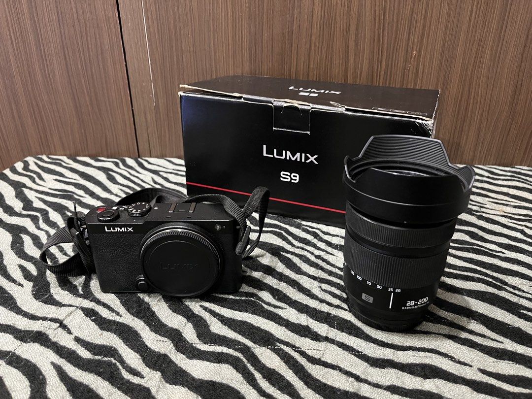 Panasonic Lumix S9 Mirrorless Camera (Category: Cameras) located in Cebu City. Submitted by miguelmon (Listing ID 1457499748, Image 1). Description: Panasonic Lumix X9 • Lumix S series lens 28-200mm • Hood lens • Lumix strap • Type C charger • Camera bag • Complete with box • No issue - Check all you want upon meet up.