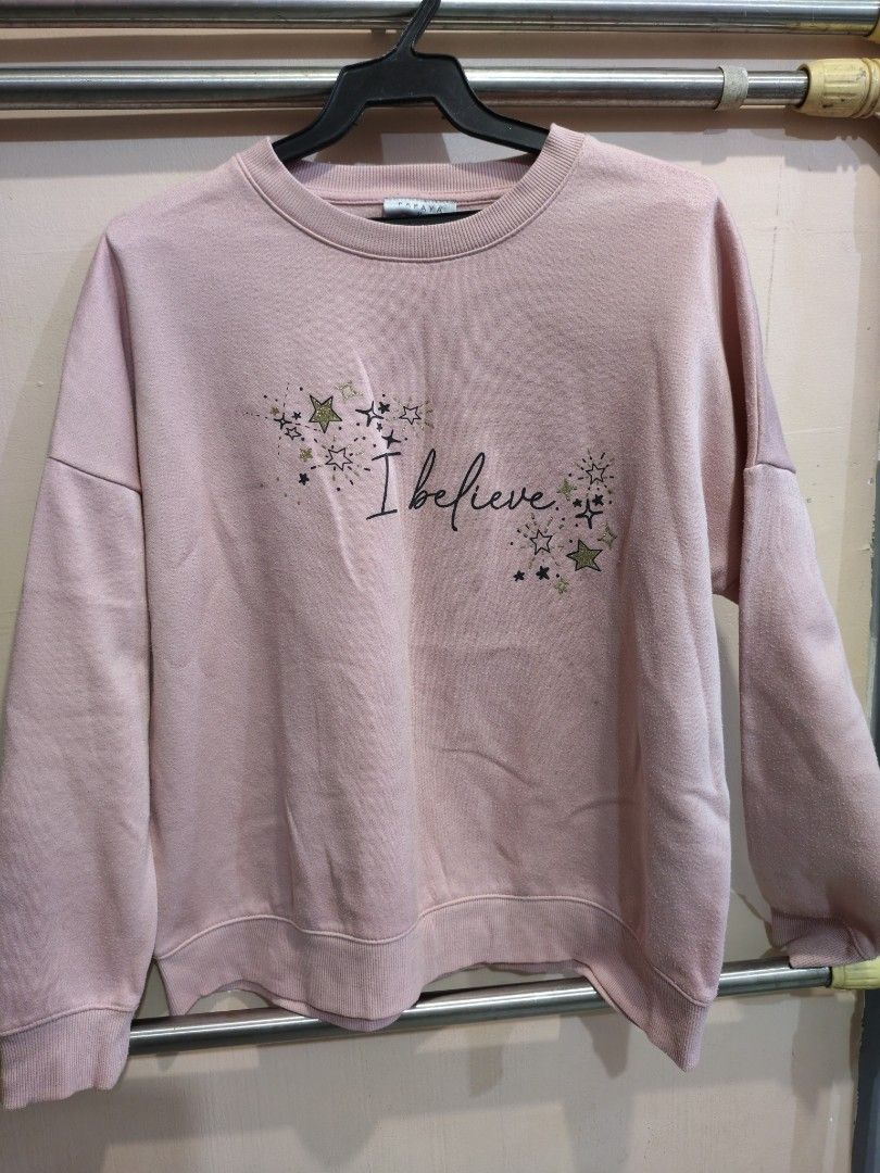 Papaya Pink "I Believe" Graphic Sweatshirt Size M (Category: Coats, Jackets and Outerwear) located in Marikina City. Submitted by noemitee (Listing ID 1457417543, Image 1). Description: - Cute pink sweatshirt from Papaya - Features "I believe" graphic with stars and sparkles - Crew neck, long sleeves - Ideal for casual wear - Pairs well with jeans or leggings.