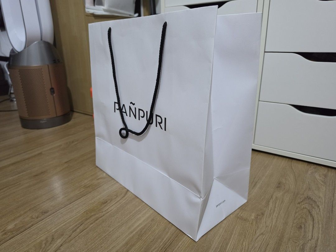 Pañpuri Paper Bag (Category: Craft Supplies & Tools) located in Valenzuela. Submitted by minami34 (Listing ID 1457395881, Image 2). Description: - Authentic Pañpuri paper bag - Classic white design with embossed logo - Sturdy and reusable - Ideal for shopping or gifting Dimensions: (L- 40.25cm x W- 18.05cm x D - 40cm) Reason for selling: Declutter Note: Shipping Fee (SF) still not included. Mode of Payment: Bank Transfer (BDO/BPI) or GCash Delive