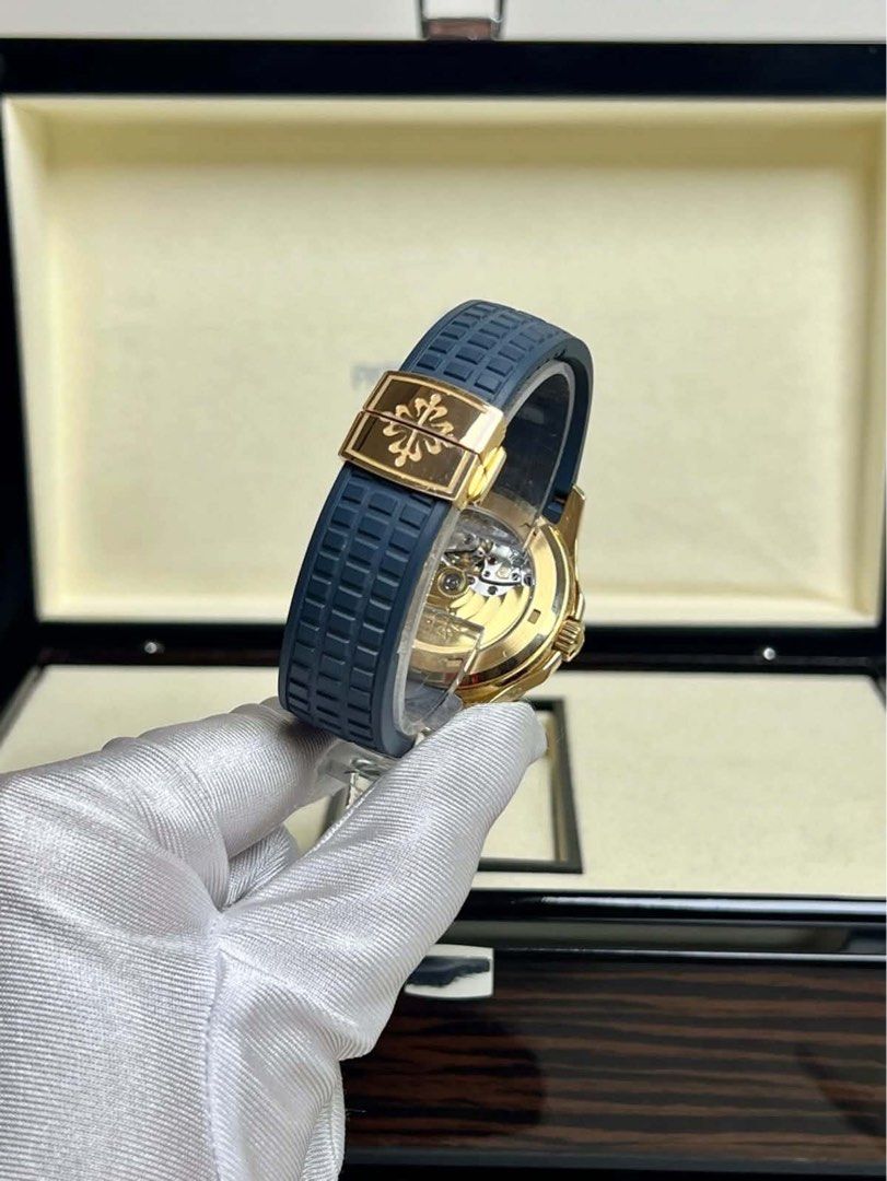 Patek Philippe Aquanaut 5261R (Category: Luxury Watches) located in Manila. Submitted by donijosemiguel (Listing ID 1457380878, Image 3). Description: - Patek Philippe Aquanaut - Rose gold case - Blue dial - Moon phase complication - Annual calendar complication - Original box and papers included - Rubber strap with gold deployant clasp - Very clean condition - 2023 model complete set.