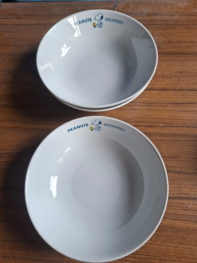 Peanuts Snoopy Bowl (Category: Dinnerware & Cutlery) located in Consolacion. Submitted by luxekerei (Listing ID 1457400817, Image 2). Description: - 5cm high - 16cm in diameter - white ceramic Peanuts Snoopy and Woodstock promotional bowl featuring blue text and character graphics..
