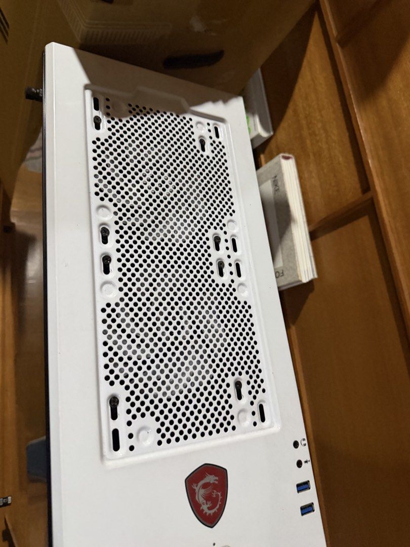 Phanteks Eclipse P400 White ATX Tower Computer Case with GPU Bracket (Category: Desktops) located in Makati City. Submitted by coachjorge.penguin (Listing ID 1457474594, Image 3). Description: - Phanteks Eclipse P400 PC Case - Color: White - Features tempered glass side panel - Comes with original box - Excellent airflow due to mesh front panel - Spacious interior for components Also selling: 14700k I7 (20,000 pesos) Thermalight AIO 360 cooler (1