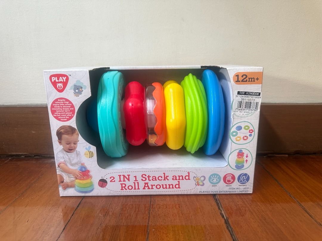 PLAY 2 in 1 Stack and Roll Around Baby Toy (Category: Infant Playtime) located in Makati City. Submitted by travelfinds34611 (Listing ID 1457408262, Image 1). Description: Brand New, Unopened Box - Fun stacking and rolling toy for babies 12 months and up. - Includes colorful rings to stack. - Features a base that rolls for added fun. - Helps develop motor skills and shape recognition. - Perfect for little ones exploring and learning..