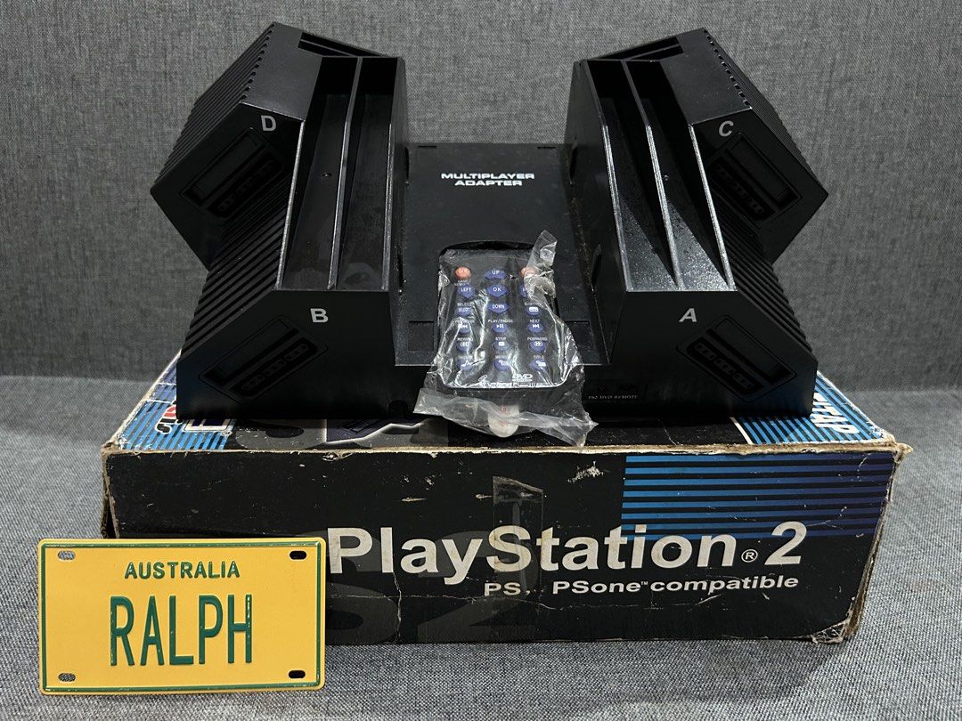 Playstation Stand (Category: PlayStation) located in Caloocan City. Submitted by metro.toys.online (Listing ID 1457348913, Image 1). Description: Playstation stand, multi tap, and dvd remote control. Vintage. Acquired from the middle east. Box condition 8/10. Un used. Removed button cell battery from remote only. Thank you for looking..