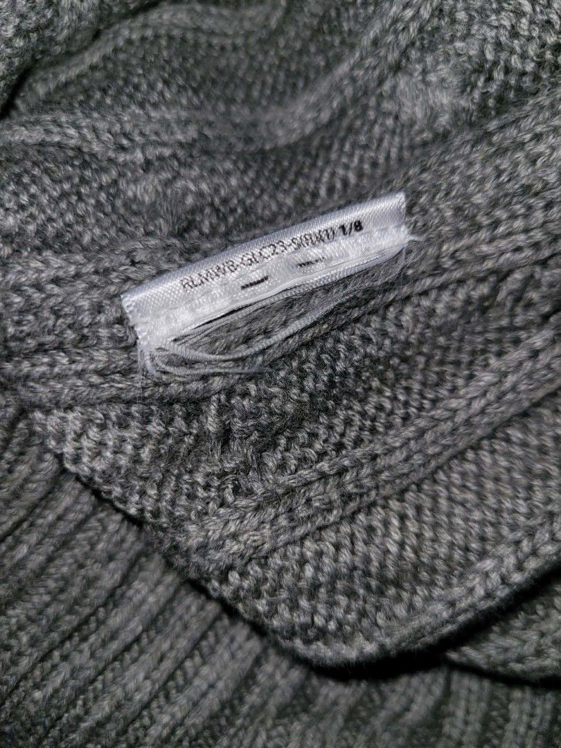 Polo Ralph Lauren Grey Cable Knit Sweater (Category: Coats, Jackets and Outerwear) located in Kabankalan. Submitted by stylesavy (Listing ID 1457383064, Image 3). Description: - Brand: Polo Ralph Lauren -w26 x L23 - Color: Grey - Material: Cable Knit - Style: Long sleeve, crew neck - Features: Signature embroidered pony logo on chest - Comfort: Comfortable and classic - Versatility: Great for layering or wearing alone.
