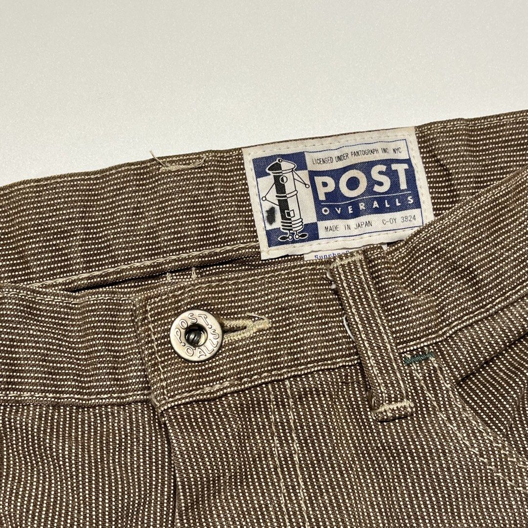 Post Overalls Brown Striped Carpenter Pants (Category: Jeans) located in Balanga. Submitted by goodiegarments (Listing ID 1457456994, Image 3). Description: Post Overalls Brown Striped Carpenter Pants Made in Japan Measurements: Waist: 33-34 in. Length: 43 in. Thigh: 12 in. Hem: 8 in. Condition: Excellent pre-owned condition, has one missing button at the back pocket and has heel drag at one leg. Pants is 100% cotton, Made in Japan. Features a br