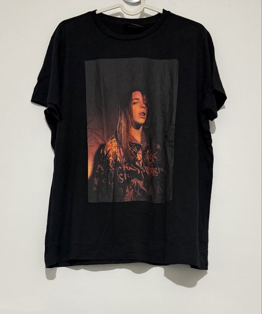 Primark x Billie Eilish Graphic T-shirt (Category: Shirts) located in Naga. Submitted by tiindahunts (Listing ID 1457376336, Image 1). Description: From Dubai box! Chest length 22" Length 27" Laid flat.