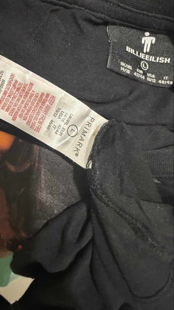 Primark x Billie Eilish Graphic T-shirt (Category: Shirts) located in Naga. Submitted by tiindahunts (Listing ID 1457376336, Image 2). Description: From Dubai box! Chest length 22" Length 27" Laid flat.