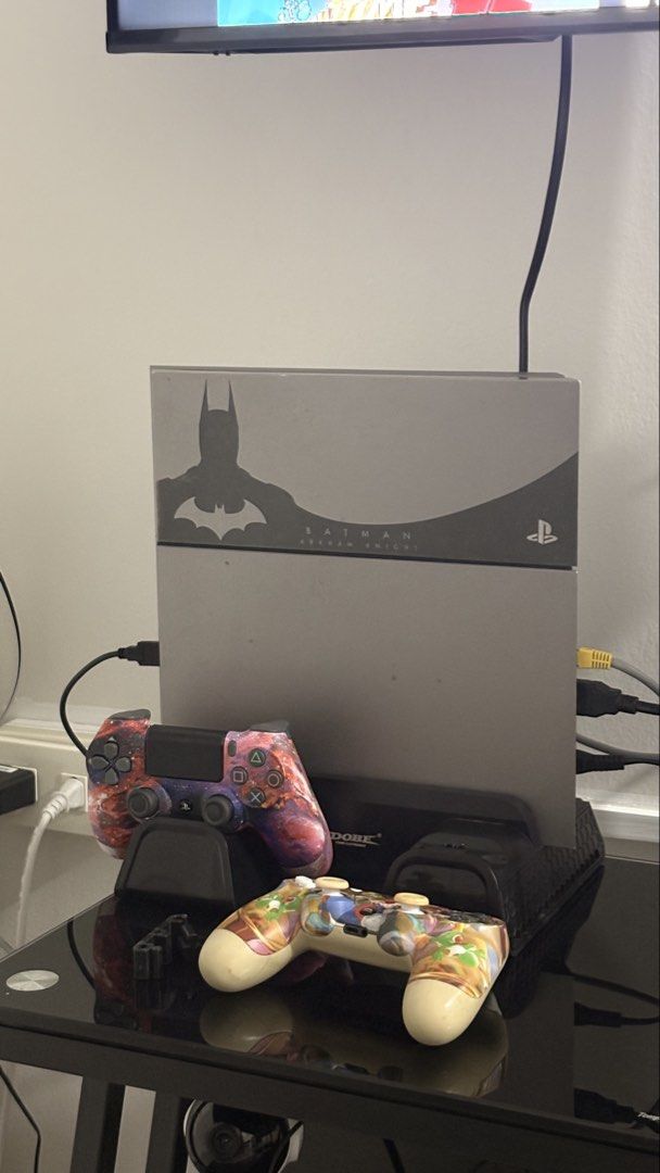 PS4 Batman Arkham Knight Edition (Category: PlayStation) located in Batangas. Submitted by jimmilton_ (Listing ID 1457432423, Image 1). Description: - Limited Edition Batman Arkham Knight PS4 - Includes 2 Custom Controllers: 1 Galaxy Design, 1 Cartoon Character Design - Comes with a Controller Charging Dock - All Necessary Cables Included.