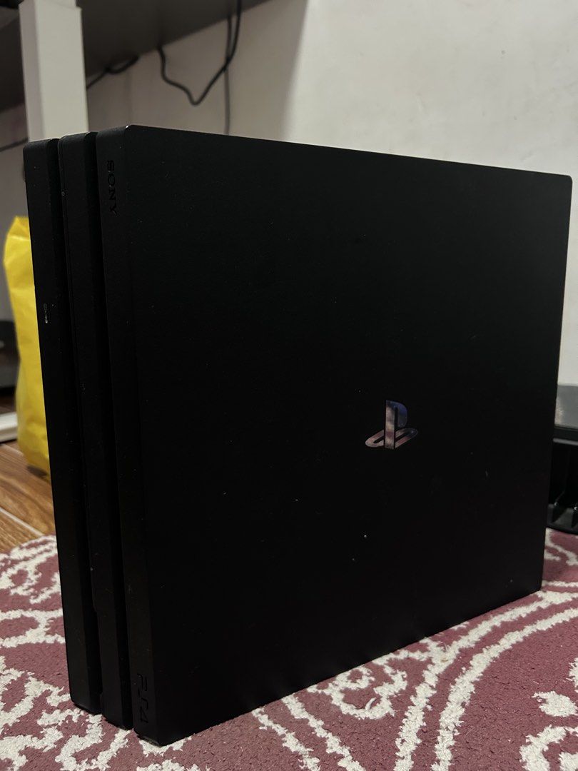PS4 Pro 1TB + 10 Games (Category: PlayStation) located in Santa Maria. Submitted by jcthegreat13 (Listing ID 1457364149, Image 2). Description: Selling my PS4 Pro 1TB including 10 games. RFS: Upgrading to PS5.
