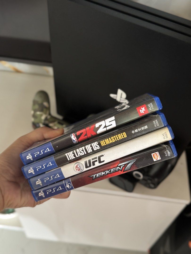 PS4 Pro 1TB complete package (Category: PlayStation) located in Bulacan. Submitted by gemini_7 (Listing ID 1457339145, Image 3). Description: Inclusions: -PS4 Pro (original box not included will be carefully packed for shipping) -2 original ds4 controllers -charging dock + console stand + CD organizers -power cable -HDMI cable -USB cable for controller Games -tekken7 -2k25 -The Last of Us Remastered -UFC PS4 Pro is well taken care of. Ready to us