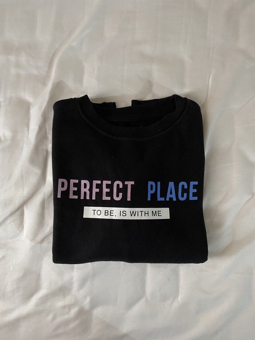Pull & Bear Black Cropped Sweatshirt (Category: Coats, Jackets and Outerwear) located in Pasig City. Submitted by fountainpenmd (Listing ID 1457336759, Image 2). Description: - Black cropped sweatshirt from Pull & Bear - Gradient pink and blue text - Long sleeves.