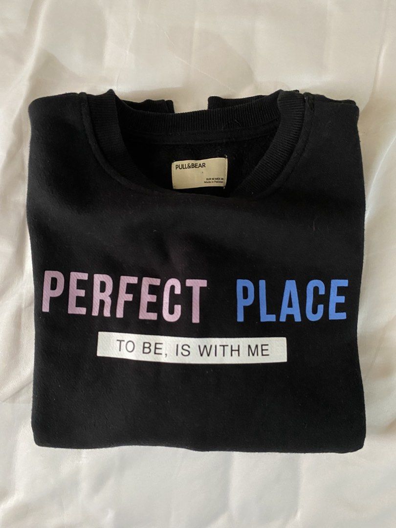 Pull & Bear Black Cropped Sweatshirt (Category: Coats, Jackets and Outerwear) located in Pasig City. Submitted by fountainpenmd (Listing ID 1457336759, Image 3). Description: - Black cropped sweatshirt from Pull & Bear - Gradient pink and blue text - Long sleeves.