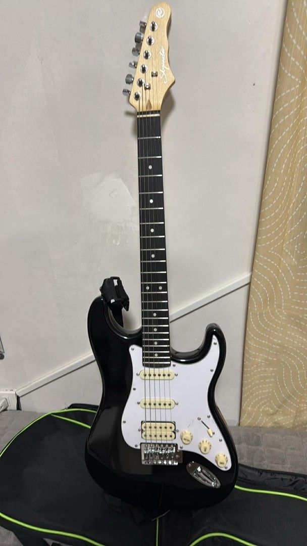 RJ Skycaster Electric Guitar (Category: Musical Instruments) located in Las Pinas. Submitted by youngeagle.7b0753 (Listing ID 1457362448, Image 1). Description: RJ Basic Electrics - Skycaster EG - excellent condition - may plastic pa yung pickguard at makinis entire body, pwede sa maselan - tested only then natambak na lang sa bahay - includes guitar strap, cord, trembar/whammy bar, and hex wrench - with free padded bag 📍Las Piñas/Parañaque.