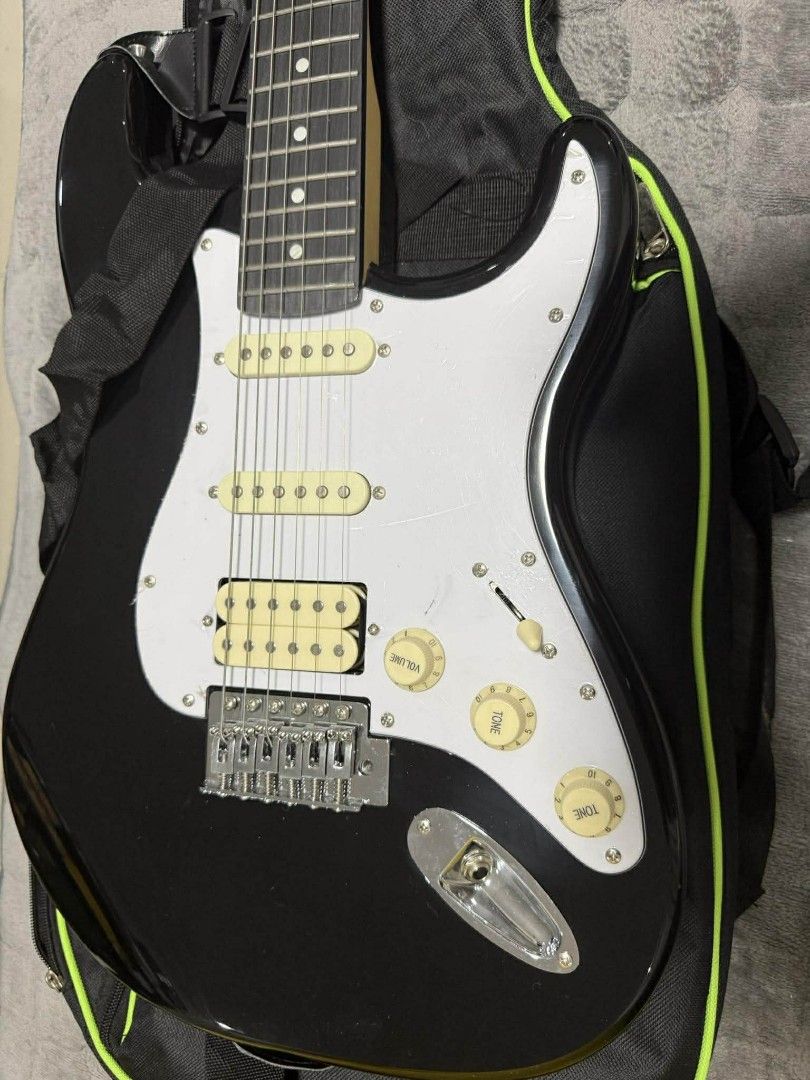 RJ Skycaster Electric Guitar (Category: Musical Instruments) located in Las Pinas. Submitted by youngeagle.7b0753 (Listing ID 1457362448, Image 2). Description: RJ Basic Electrics - Skycaster EG - excellent condition - may plastic pa yung pickguard at makinis entire body, pwede sa maselan - tested only then natambak na lang sa bahay - includes guitar strap, cord, trembar/whammy bar, and hex wrench - with free padded bag 📍Las Piñas/Parañaque.