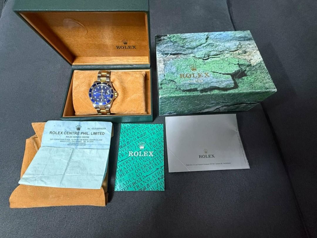 Rolex Submariner Date 16613 "Bluesy" (Category: Luxury Watches) located in Manila. Submitted by jeysibub (Listing ID 1457513327, Image 2). Description: Rolex Submariner Date "Bluesy" 40mm No Rehaut (Pre-2005/2006) Reference No. 16613 18k Yellow Gold & Stainless Steel Bracelet Includes the following: Original Rolex Inner Box Original Rolex Outer Box Official Translation Booklet Rolex Submariner Instruction Booklet Rolex Service Center Receipt/Pape