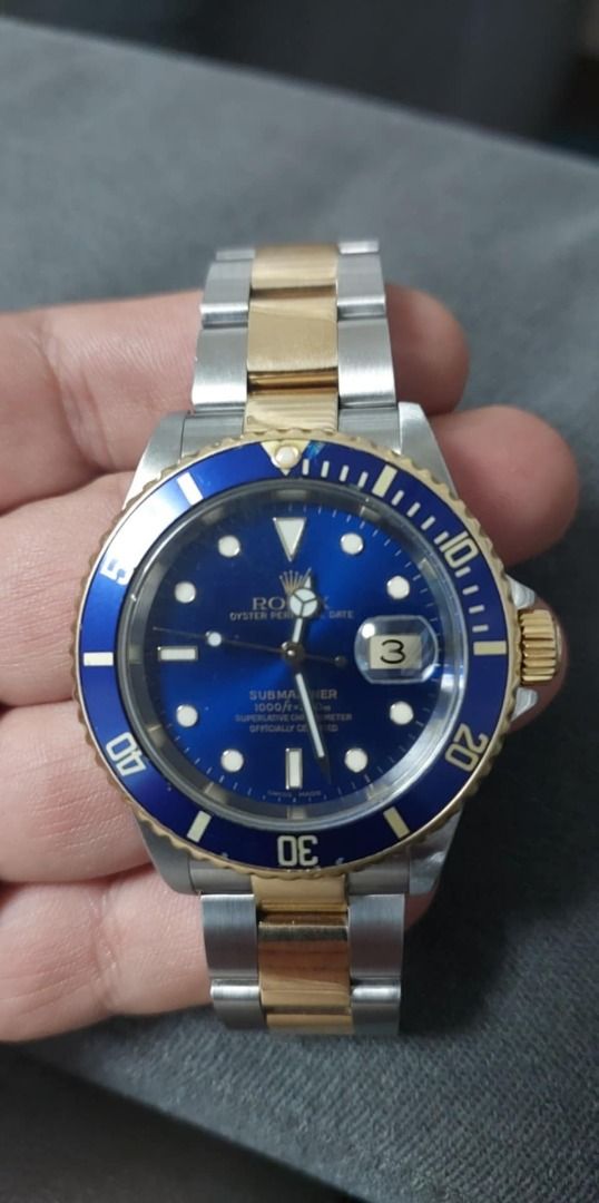 Rolex Submariner Date 16613 "Bluesy" (Category: Luxury Watches) located in Manila. Submitted by jeysibub (Listing ID 1457513327, Image 1). Description: Rolex Submariner Date "Bluesy" 40mm No Rehaut (Pre-2005/2006) Reference No. 16613 18k Yellow Gold & Stainless Steel Bracelet Includes the following: Original Rolex Inner Box Original Rolex Outer Box Official Translation Booklet Rolex Submariner Instruction Booklet Rolex Service Center Receipt/Pape