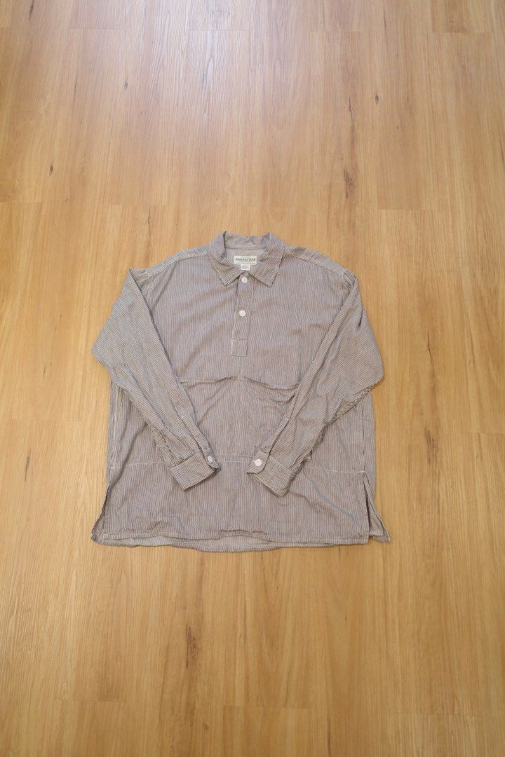Sassafras Landscaper Shell Half (Hickory) (Category: Coats, Jackets and Outerwear) located in Pasig City. Submitted by rinse___repeat (Listing ID 1457394480, Image 1). Description: Sassafras Landscaper Shell Half (Hickory) This is Sassafras’ take on a pullover shirt, done in a hickory stripe pattern. There are two sizable pockets in front, as well as three smaller compartments on the bottom inner layer of the shirt. Size L Pit to pit 25.5” / Leng
