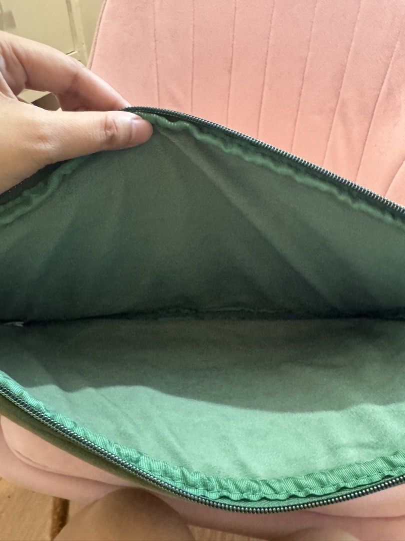 Starbucks Green Laptop Sleeve (Category: Laptop Bags & Sleeves) located in Dasmarinas. Submitted by queensu (Listing ID 1457401916, Image 3). Description: Green laptop sleeve from Starbucks. Features a cute polar bear with a Santa hat holding a cup. The inside is soft and padded. Great for storing your laptop or tablet. Has a red Starbucks tag on the zipper. Some minor marks on the front and back, as shown in photos. .
